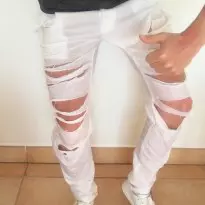 very ripped wet white jeans
